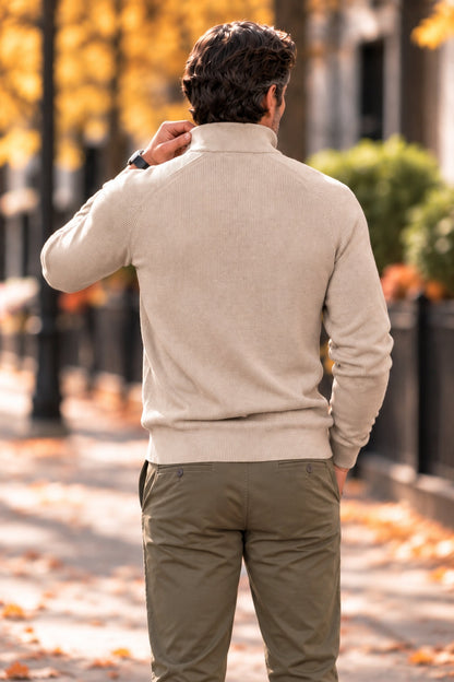 Back view of a beige ribbed-knit half-zip sweater