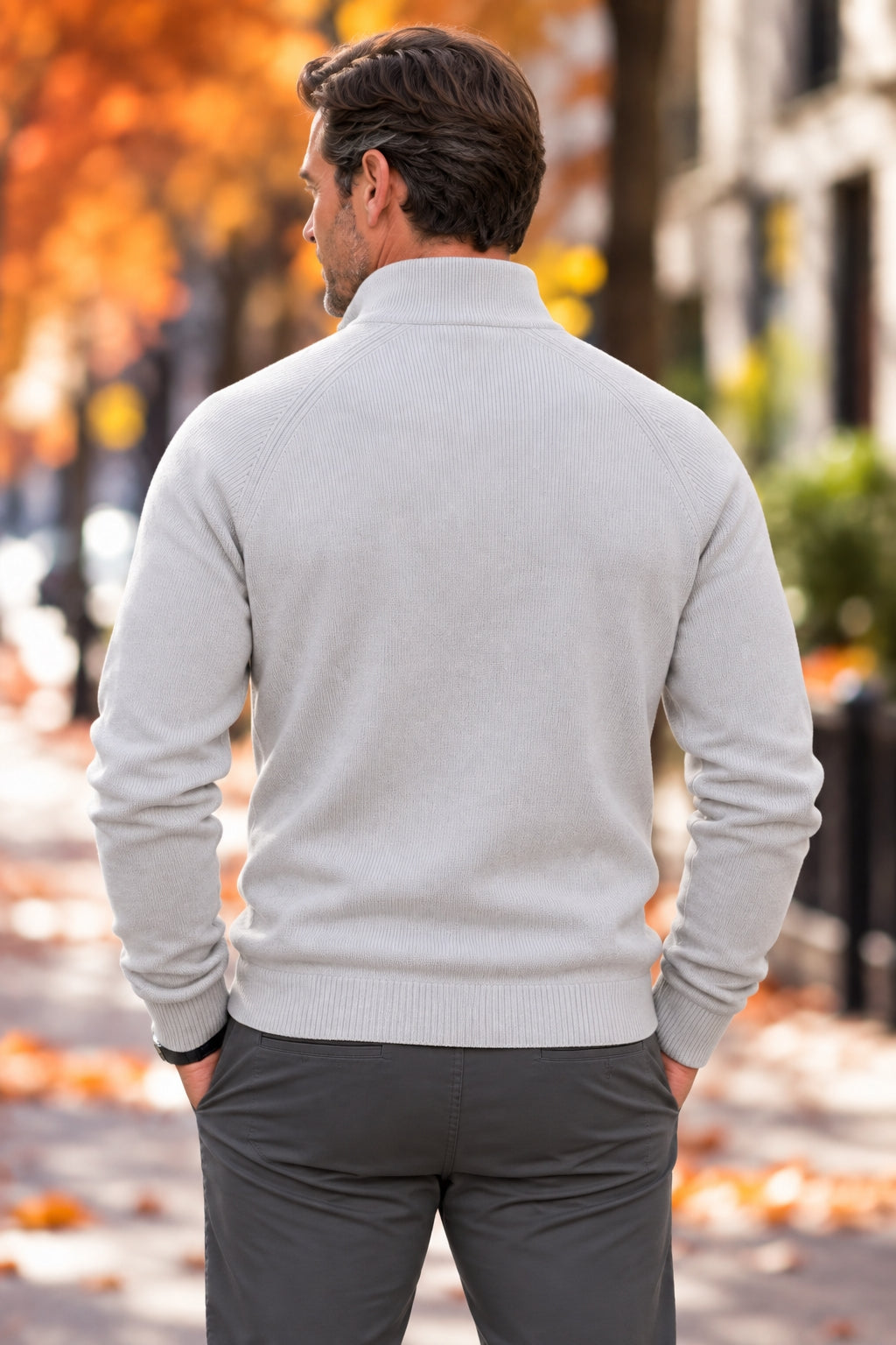 Back view of a gray ribbed-knit half-zip sweater