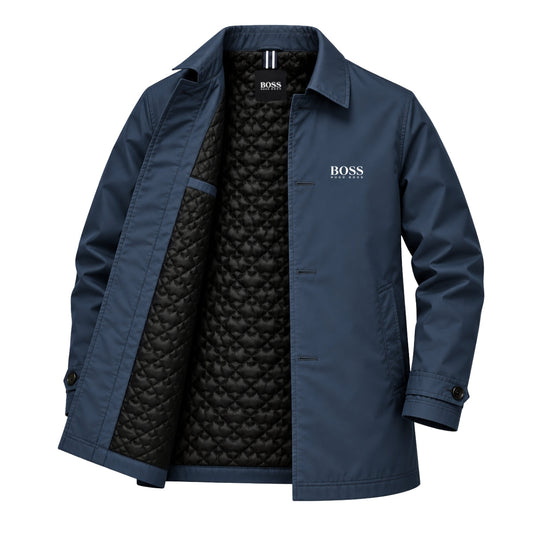Men's navy button-front coat shown open to reveal the black quilted lining, with point collar and side welt pocket