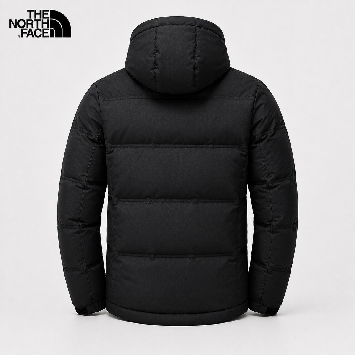 Back view of men's black padded hooded winter jacket
