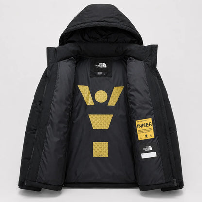 Inside view of black padded winter jacket showing the printed inner lining and hood