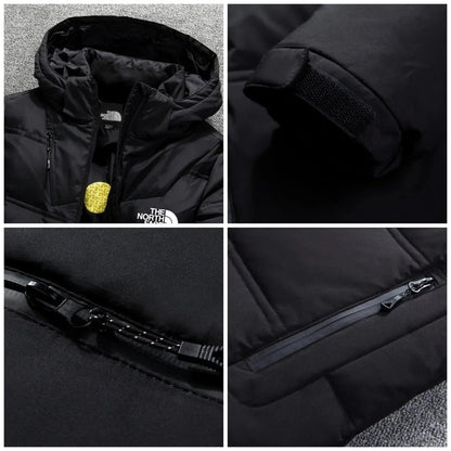 Close-up details of black padded jacket: hood, adjustable cuff tab and zip pockets